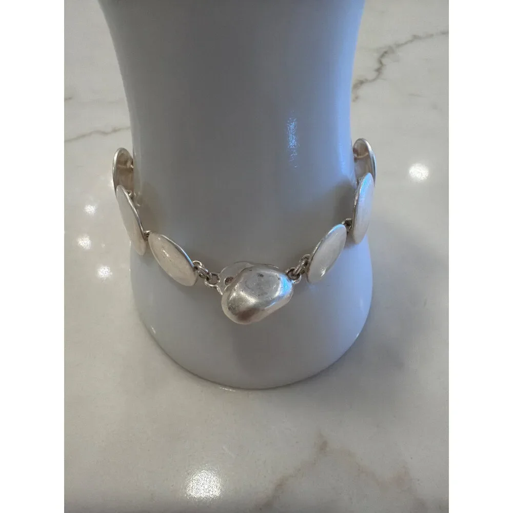Chill Boutique Consignment silver tone